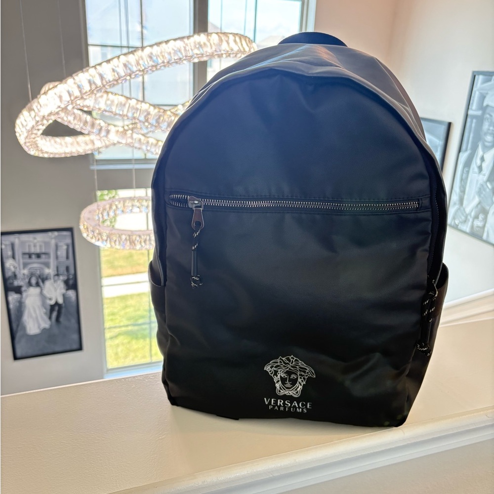 Versace Black Backpack Sleek Durable Designed (lightly used no rips no tears )